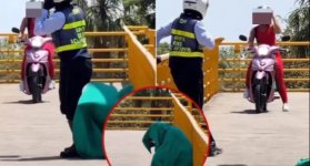 ¡Ni en las películas! Agente de tránsito se escondió bajo una sábana para detectar infractores