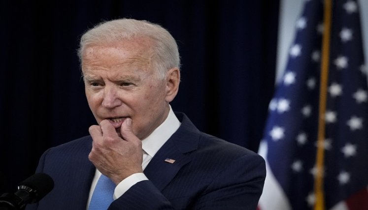El presidente Biden llamó pidió a la inteligencia estadounidense investigar la tesis de un escape accidental de un laboratorio chino. / AFP