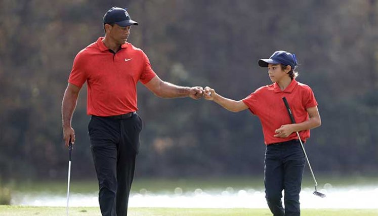 Tiger Woods y su hijo Charlie hicieron una buena presentación.