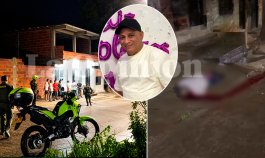 : El cuerpo del transportador quedó tendido sobre el pavimento, mientras la lluvia caía intensamente sobre la escena del crimen. / Foto: cortesía