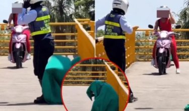 ¡Ni en las películas! Agente de tránsito se escondió bajo una sábana para detectar infractores